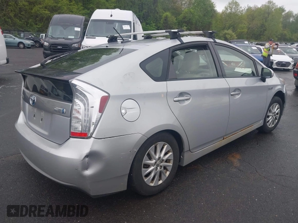 2012 Toyota Prius with VIN JTDKN3DP2C3004184, listed as a IAAI auction lot 42179963 with 210,815 mi miles and . Bid and sale history available at DreamBid. Image 4.