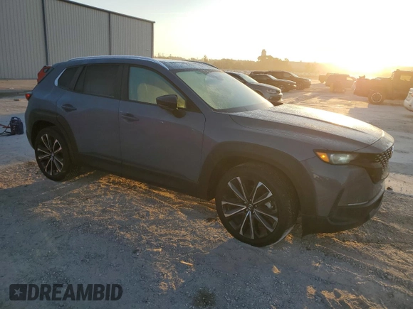 2023 Mazda CX-50 S Premium Plus with VIN 7MMVABEM3PN102285, listed as a Copart auction lot 77684064 with 14,190 mi miles and Salvage Title. Bid and sale history available at DreamBid. Image 4.