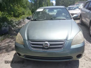 2002 Nissan Altima S z VIN 1N4AL11D02C147963, wystawiony jako IAAI lot #42318252 z przebiegiem 203 894 mil mil oraz . Historia ofert i sprzedaży dostępna na DreamBid. Obrazek 12.