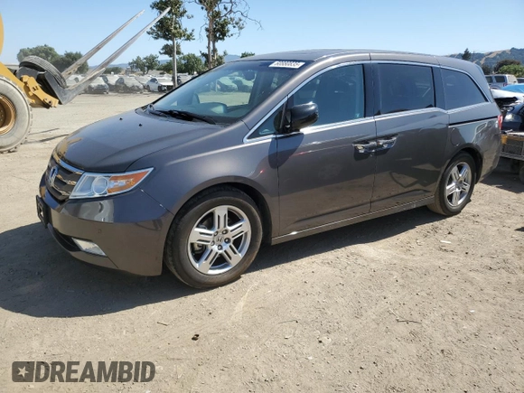 2012 Honda Odyssey Touring с VIN 5FNRL5H9XCB116455, выставлен на аукционе Copart как лот 60880835 с пробегом 96 672 миль миль и Списание • Salvage title. История ставок и продаж доступна на DreamBid. Изображение 1.