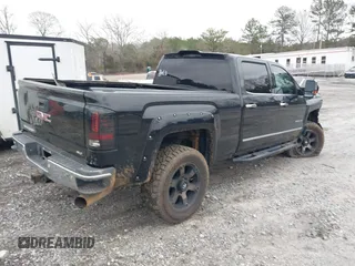 2018 GMC Sierra 2500HD SLT with VIN 1GT12TEY9JF279932, listed as a IAAI auction lot 41583208 with 70,465 mi miles. Bid and sale history available at carsss.com. Image 4.