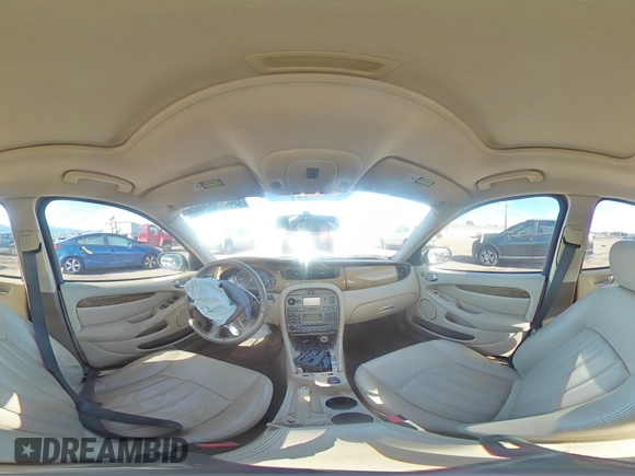 2007 Jaguar X-Type z VIN SAJWA51A07WJ14424, wystawiony jako Copart lot #84556864 z przebiegiem Nie podano mil oraz Szkody całkowita. Historia ofert i sprzedaży dostępna na DreamBid. Obrazek 13.