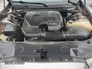 2012 Dodge Charger Police z VIN 2C3CDXAG7CH122767, wystawiony jako Copart lot #55116355 z przebiegiem 172 312 mil mil oraz Szkoda całkowita • Salvage title. Historia ofert i sprzedaży dostępna na DreamBid. Obrazek 11.