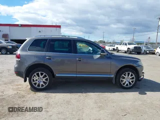 2010 Volkswagen Touareg VR6 with VIN WVGBF7A96AD002466, listed as a IAAI auction lot 41709052 with 204,819 mi miles and . Bid and sale history available at DreamBid. Image 13.