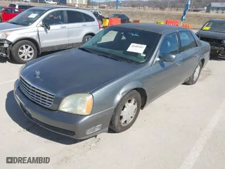 2003 Cadillac DeVille with VIN 1G6KD54Y13U173679, listed as a IAAI auction lot 41686383 with 106,054 mi miles. Bid and sale history available at carsss.com. Image 2.