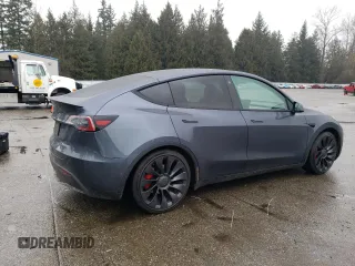 2022 Tesla Model Y Performance with VIN 7SAYGDEF2NF459268, listed as a Copart auction lot 45764735 with 64,421 mi miles and Salvage title. Bid and sale history available at DreamBid. Image 3.