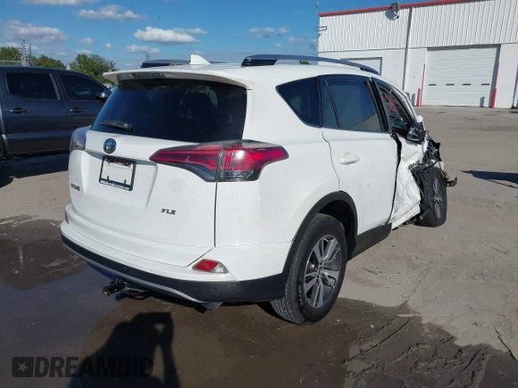 2018 Toyota RAV4 XLE with VIN JTMWFREV8JJ157496, listed as a IAAI auction lot 42249948 with 64,767 mi miles and . Bid and sale history available at DreamBid. Image 4.