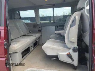 1999 Volkswagen EuroVan с VIN WV2MH2703XH045037, выставлен на аукционе Copart как лот 57109265 с пробегом 265 855 миль миль и Списание • Salvage title. История ставок и продаж доступна на DreamBid. Изображение 11.