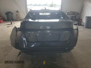 2016 Toyota Prius Two z VIN JTDKBRFU4G3515948, wystawiony jako Copart lot #58706655 z przebiegiem Nie podano mil oraz Nie do naprawy • Non repairable. Historia ofert i sprzedaży dostępna na DreamBid. Obrazek 6.