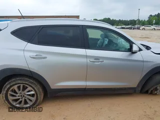 2016 Hyundai Tucson SE z VIN KM8J33A48GU116852, wystawiony jako IAAI lot #42111656 z przebiegiem 138 656 mil mil oraz . Historia ofert i sprzedaży dostępna na DreamBid. Obrazek 13.