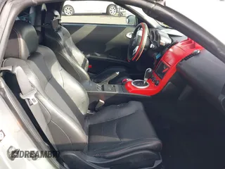 2005 Nissan 350Z Touring z VIN JN1AZ36A05M755776, wystawiony jako IAAI lot #41509506 z przebiegiem 79 148 mil mil oraz . Historia ofert i sprzedaży dostępna na DreamBid. Obrazek 8.