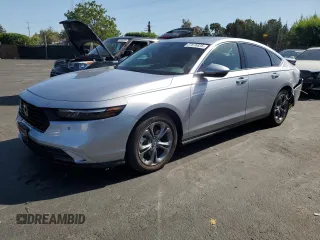 2023 Honda Accord EX-L with VIN 1HGCY2F65PA060147, listed as a Copart auction lot 57876835 with 10,995 mi miles and Salvage title. Bid and sale history available at DreamBid. Image 1.