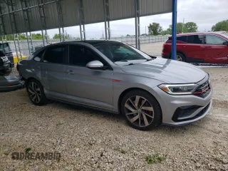 2019 Volkswagen Jetta GLI S z VIN 3VW6T7BU4KM222404, wystawiony jako Copart lot #55097435 z przebiegiem 121 664 mil mil oraz Szkoda całkowita • Salvage title. Historia ofert i sprzedaży dostępna na DreamBid. Obrazek 4.