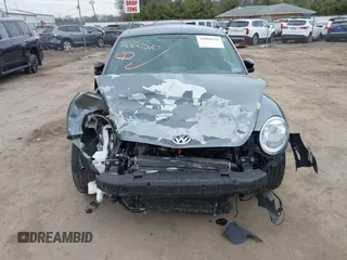 2012 Volkswagen Beetle with VIN 3VWV67AT0CM663718, listed as a IAAI auction lot 41860510 with 99,932 mi miles and . Bid and sale history available at DreamBid. Image 13.