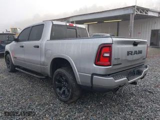 2025 Ram 1500 Big Horn with VIN 1C6SRFFP5SN502795, listed as a IAAI auction lot 41498981 with 6,565 mi miles. Bid and sale history available at carsss.com. Image 3.