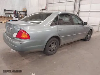 2001 Toyota Avalon XL w/Bucket Seats with VIN 4T1BF28B01U162970, listed as a IAAI auction lot 41824530 with 255,051 mi miles. Bid and sale history available at carsss.com. Image 4.
