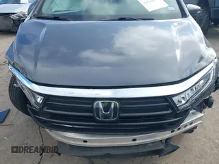 2022 Honda Odyssey Touring with VIN 5FNRL6H80NB023623, listed as a IAAI auction lot 41512586 with 63,329 mi miles and . Bid and sale history available at DreamBid. Image 13.