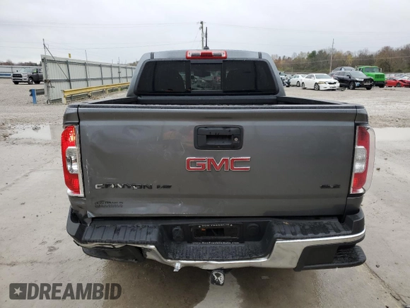 2020 GMC Canyon 4WD SLE with VIN 1GTG6CEN3L1237373, listed as a Copart auction lot 81198384 with 28,452 mi miles and Salvage Title. Bid and sale history available at carsss.com. Image 6.
