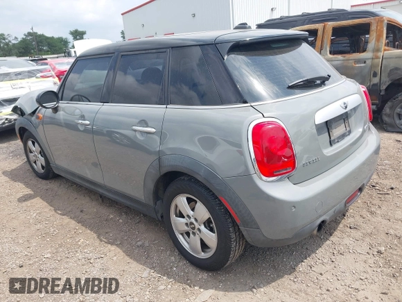 2015 MINI Hardtop 4 Door with VIN WMWXS5C56FT830418, listed as a IAAI auction lot 42132285 with 111,428 mi miles and . Bid and sale history available at DreamBid. Image 3.