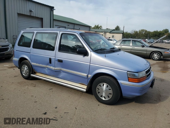 1993 Dodge Caravan z VIN 2B4GH2533PR287787, wystawiony jako Copart lot #71940684 z przebiegiem 107 939 mil mil oraz Szkoda całkowita • Salvage title. Historia ofert i sprzedaży dostępna na DreamBid. Obrazek 4.