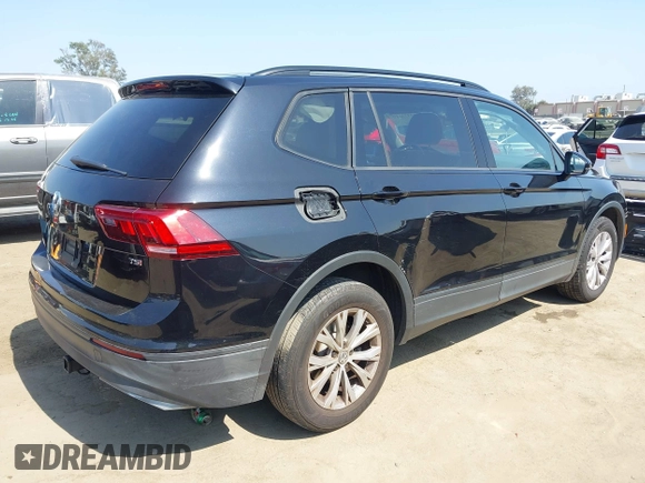 2018 Volkswagen Tiguan S with VIN 3VV1B7AX7JM092033, listed as a IAAI auction lot 42373619 with 124,775 mi miles and . Bid and sale history available at DreamBid. Image 4.