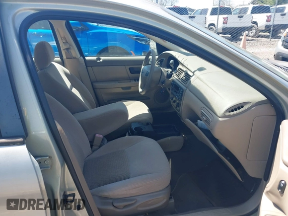 2003 Ford Taurus SE Standard with VIN 1FAFP53U33A228466, listed as a IAAI auction lot 41973883 with 46,377 mi miles. Bid and sale history available at carsss.com. Image 5.