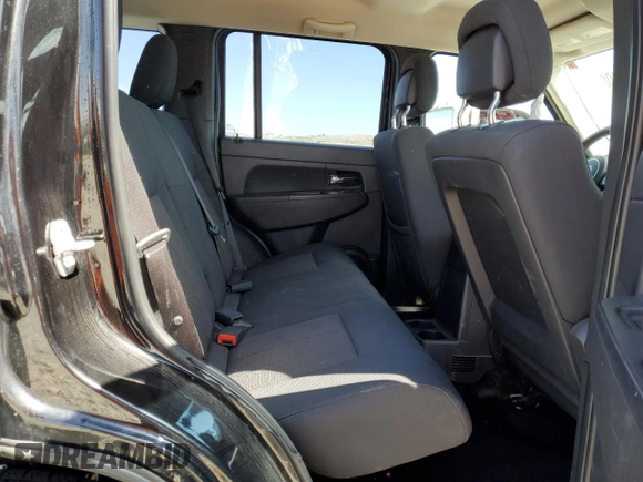 2012 Jeep Liberty Sport z VIN 1C4PJMAK2CW209468, wystawiony jako Copart lot #60091085 z przebiegiem 133 975 mil mil oraz Szkoda całkowita • Salvage title. Historia ofert i sprzedaży dostępna na DreamBid. Obrazek 10.