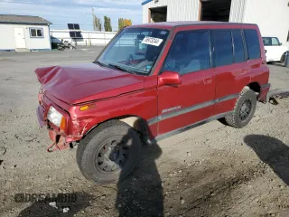 1995 Suzuki Sidekick z VIN JS3TD03V6S4113425, wystawiony jako Copart lot #76973244 z przebiegiem 152 638 mil mil oraz Szkody całkowita. Historia ofert i sprzedaży dostępna na DreamBid. Obrazek 1.