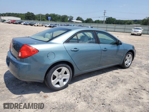 2009 Pontiac G6 1SA with VIN 1G2ZG57B294112753, listed as a Copart auction lot 60333295 with 172,422 mi miles and Salvage title. Bid and sale history available at DreamBid. Image 3.