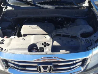 2012 Honda Pilot EX-L z VIN 5FNYF4H53CB054715, wystawiony jako Copart lot #58313505 z przebiegiem 208 505 mil mil oraz Szkoda całkowita • Salvage title. Historia ofert i sprzedaży dostępna na DreamBid. Obrazek 13.