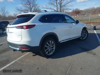 2018 Mazda CX-9 Grand Touring with VIN JM3TCBDY6J0200843, listed as a IAAI auction lot 40971233 with 94,770 mi miles. Bid and sale history available at carsss.com. Image 4.