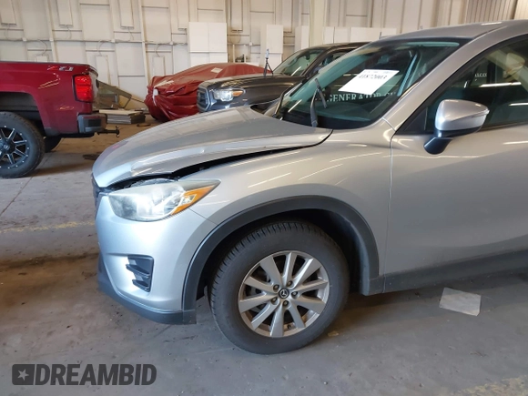 2016 Mazda CX-5 Sport with VIN JM3KE2BE5G0720507, listed as a IAAI auction lot 41872003 with 160,727 mi miles and . Bid and sale history available at carsss.com. Image 6.