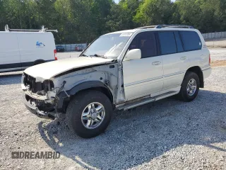 1999 Lexus LX 470 z VIN JT6HT00W1X0074382, wystawiony jako Copart lot #53612205 z przebiegiem 256 689 mil mil oraz Szkoda całkowita • Salvage title. Historia ofert i sprzedaży dostępna na DreamBid. Obrazek 1.