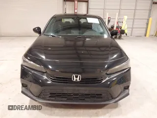 2024 Honda Civic Sport with VIN 2HGFE2F59RH519889, listed as a IAAI auction lot 41598192 with 7,451 mi miles and . Bid and sale history available at DreamBid. Image 12.