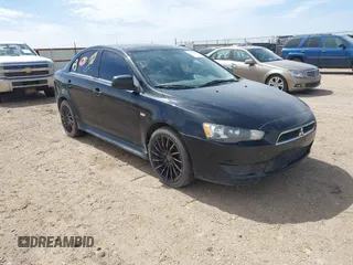 2012 Mitsubishi Lancer ES with VIN JA32U2FU7CU031017, listed as a IAAI auction lot 41823152 with 144,711 mi miles. Bid and sale history available at carsss.com. Image 1.