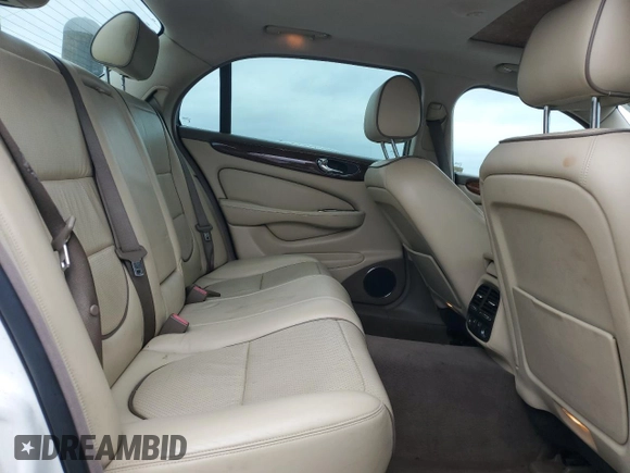 2008 Jaguar XJ with VIN SAJWA79B48SH21186, listed as a Copart auction lot 43704975 with 197,944 mi miles and Salvage Title. Bid and sale history available at carsss.com. Image 10.