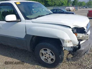 2004 Chevrolet Avalanche with VIN 3GNEC12T04G343801, listed as a IAAI auction lot 42536164 with 246,555 mi miles and . Bid and sale history available at DreamBid. Image 12.