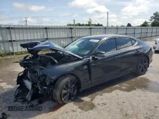 2023 Genesis G70 3.3T with VIN KMTG54TEXPU127230, listed as a Copart auction lot 58429115 with 38,724 mi miles and Salvage title. Bid and sale history available at DreamBid. Image 1.