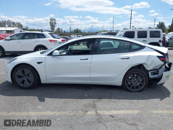 2023 Tesla Model 3 with VIN 5YJ3E1EA5PF502066, listed as a IAAI auction lot 41934960 with 17,926 mi miles and . Bid and sale history available at carsss.com. Image 15.