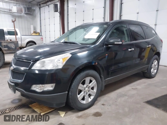 2012 Chevrolet Traverse 1LT z VIN 1GNKVGED8CJ213010, wystawiony jako IAAI lot #41491520 z przebiegiem 185 111 mil mil oraz . Historia ofert i sprzedaży dostępna na DreamBid. Obrazek 2.