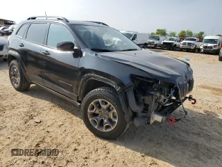 2022 Jeep Cherokee Trailhawk с VIN 1C4PJMBX8ND502686, выставлен на аукционе Copart как лот 51180645 с пробегом 62 865 миль миль и Списание • Salvage title. История ставок и продаж доступна на DreamBid. Изображение 4.