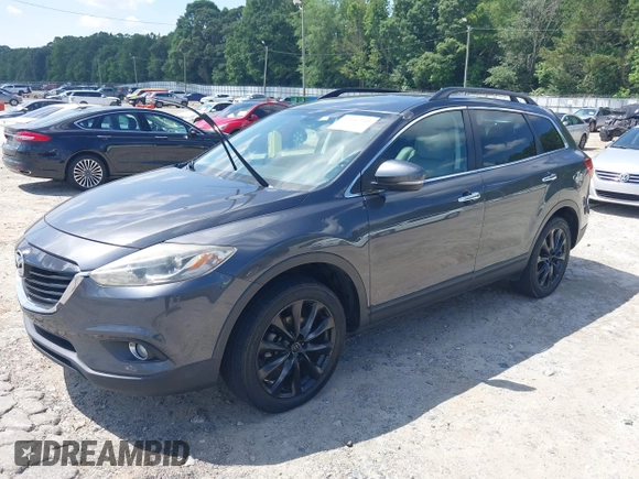 2014 Mazda CX-9 Grand Touring with VIN JM3TB2DA4E0436340, listed as a IAAI auction lot 42442249 with 102,856 mi miles and . Bid and sale history available at DreamBid. Image 17.