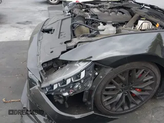2024 Ford Mustang GT z VIN 1FA6P8CF5R5420461, wystawiony jako IAAI lot #42515797 z przebiegiem 28 636 mil mil oraz . Historia ofert i sprzedaży dostępna na DreamBid. Obrazek 18.