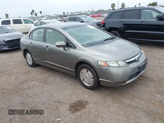 2006 Honda Civic z VIN JHMFA36286S006836, wystawiony jako IAAI lot #42324244 z przebiegiem 217 417 mil mil oraz . Historia ofert i sprzedaży dostępna na DreamBid. Obrazek 1.