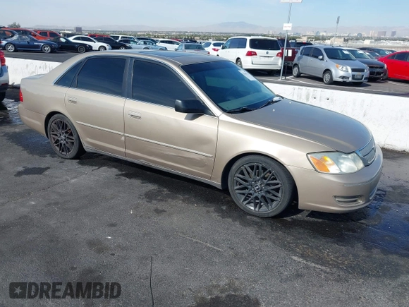 2001 Toyota Avalon XL w/Bucket Seats with VIN 4T1BF28BX1U117793, listed as a IAAI auction lot 42165172 with 247,435 mi miles. Bid and sale history available at carsss.com. Image 1.