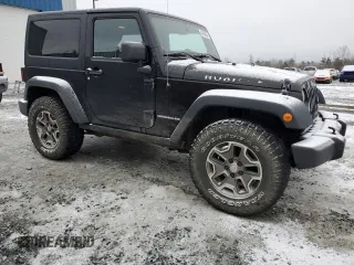 2013 Jeep Wrangler Rubicon 10th Anniversary with VIN 1C4BJWCG6DL507667, listed as a Copart auction lot 84139134 with 264,970 mi miles and Salvage Title. Bid and sale history available at DreamBid. Image 4.
