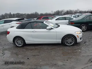 2016 BMW 2 Series 228i xDrive with VIN WBA1L9C59GV767802, listed as a IAAI auction lot 41132997 with 87,674 mi miles. Bid and sale history available at carsss.com. Image 12.
