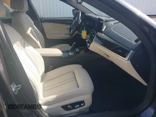 2017 BMW 5 Series 530i xDrive with VIN WBAJA7C33HG905610, listed as a IAAI auction lot 42107300 with 116,301 mi miles and . Bid and sale history available at carsss.com. Image 5.