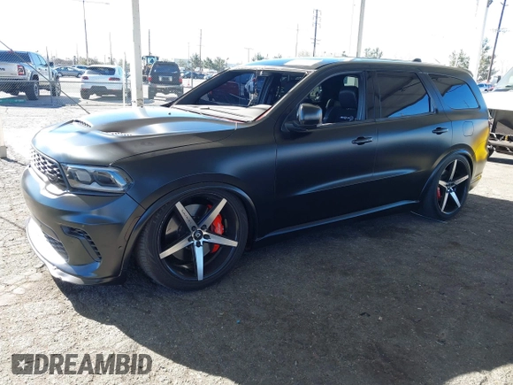 2021 Dodge Durango SRT Hellcat z VIN 1C4SDJH99MC818692, wystawiony jako IAAI lot #41070204 z przebiegiem 12 105 mil mil oraz . Historia ofert i sprzedaży dostępna na DreamBid. Obrazek 18.