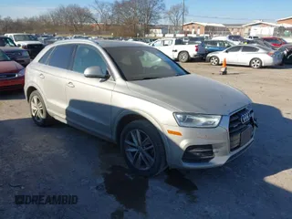 2017 Audi Q3 Premium Plus with VIN WA1JCCFS5HR011907, listed as a IAAI auction lot 41675496 with 102,591 mi miles. Bid and sale history available at carsss.com. Image 1.
